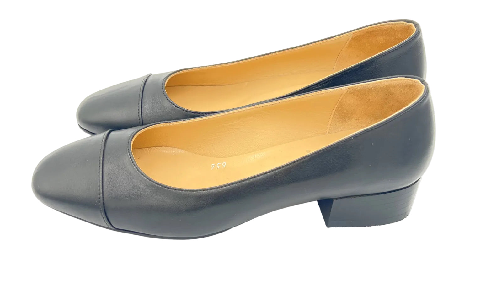 Pair of gray shoes with beige soles on a white background